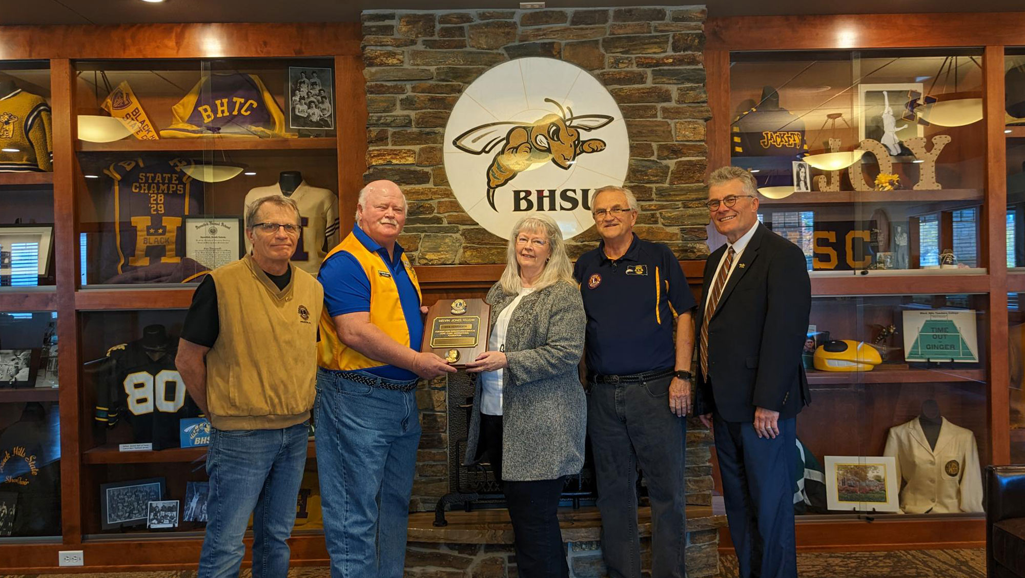 Pictured left to right: Stan Smith, Tim Penton, Deb Henriksen, John Daum and Steve Meeker, Vice President of University Advancement.