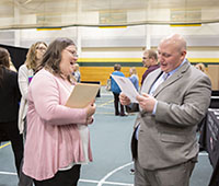 Prospective teachers talking at BHSU teacher fair