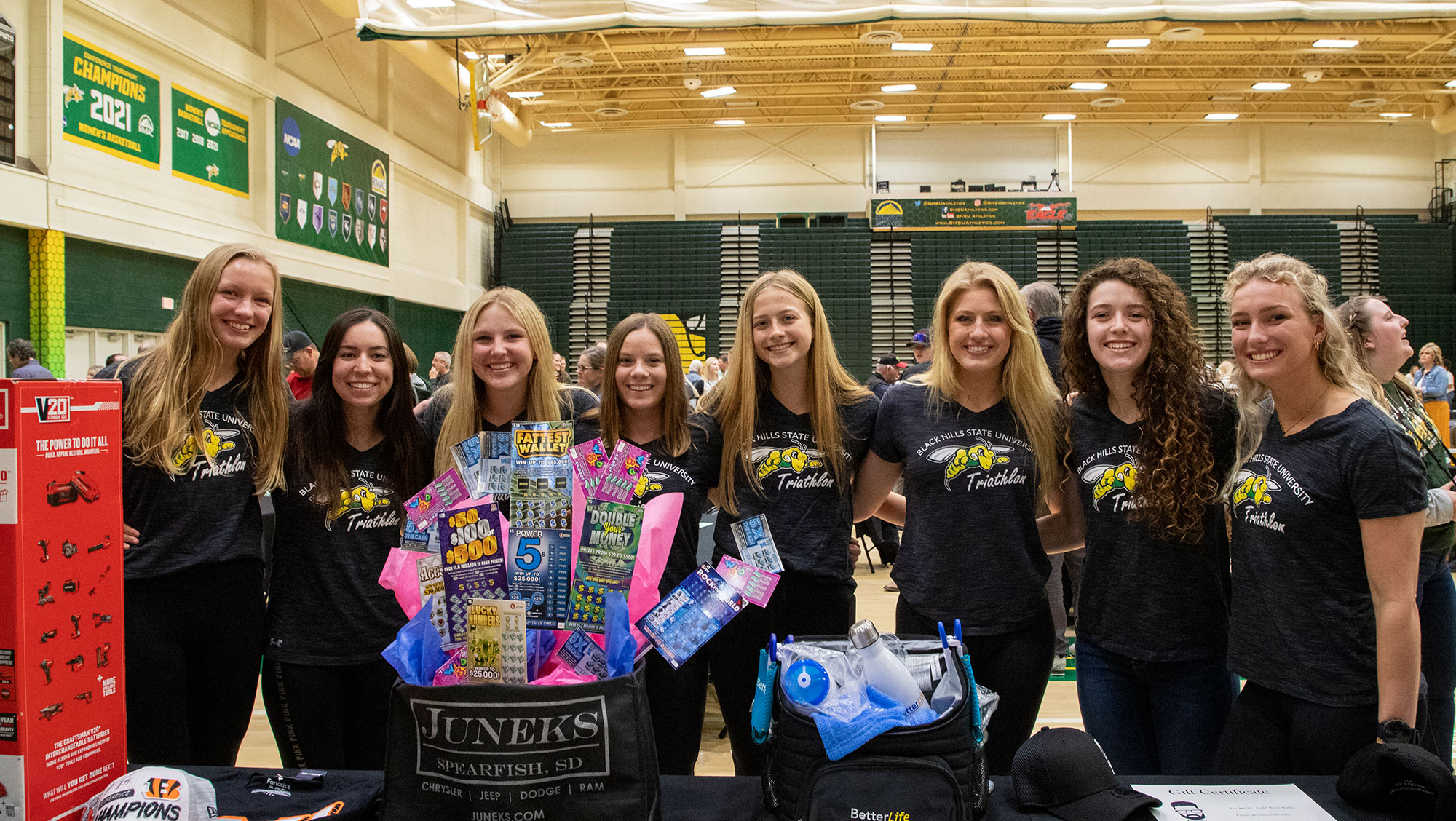 the women's soccer team poses at BHSU Gold Rush Raffle