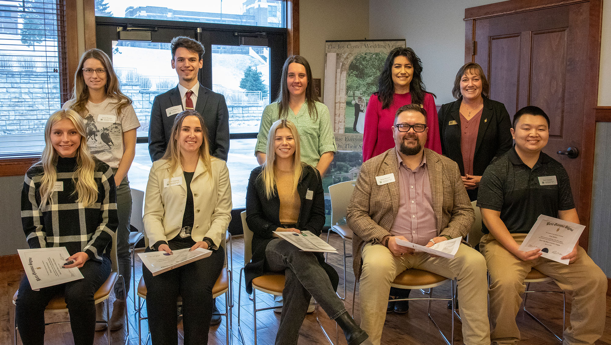 Images of students being inducted into Beta Gamma Sigma Honor Society