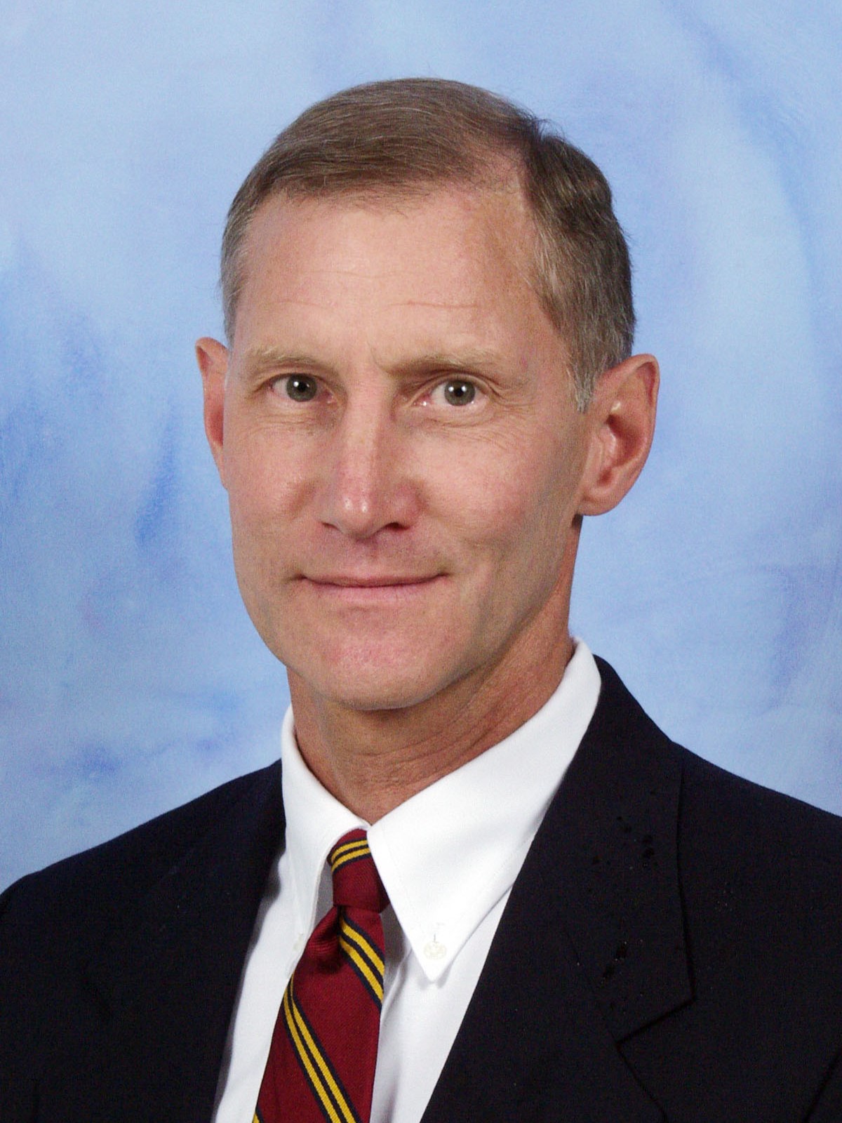 Headshot of James Hesson