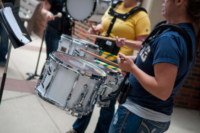 Two BHSU drummers perform.