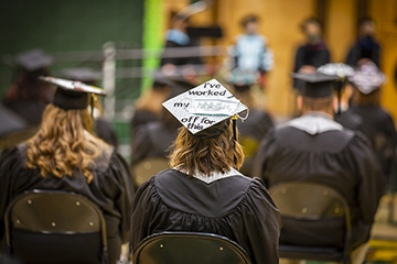 BHSU graduates sitting at spring commencement