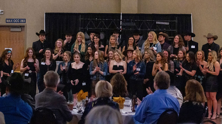 Picture of several BHSU Students grouped together for a photo at the BHSU Rodeo Fundraiser
