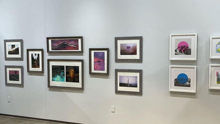 Picture of photos hanging on a wall at the BHSU Senior Art Show Gallery