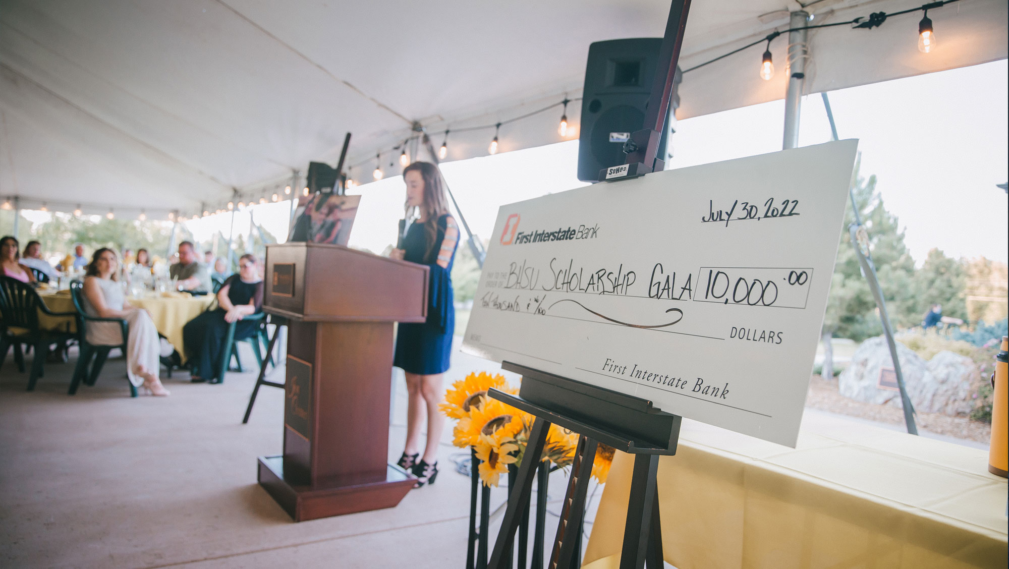 A large check on display at the 2022 Scholarship Gala