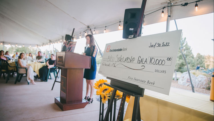 A large check on display at the 2022 Scholarship Gala