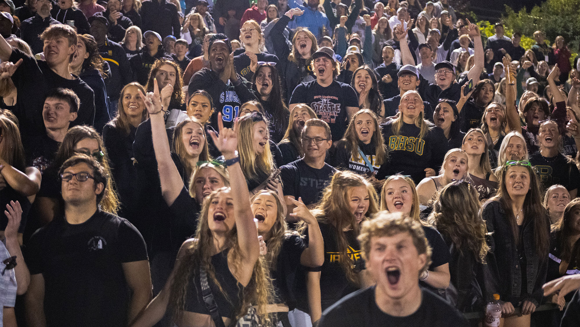 BHSU students cheer on the football team at a home game.