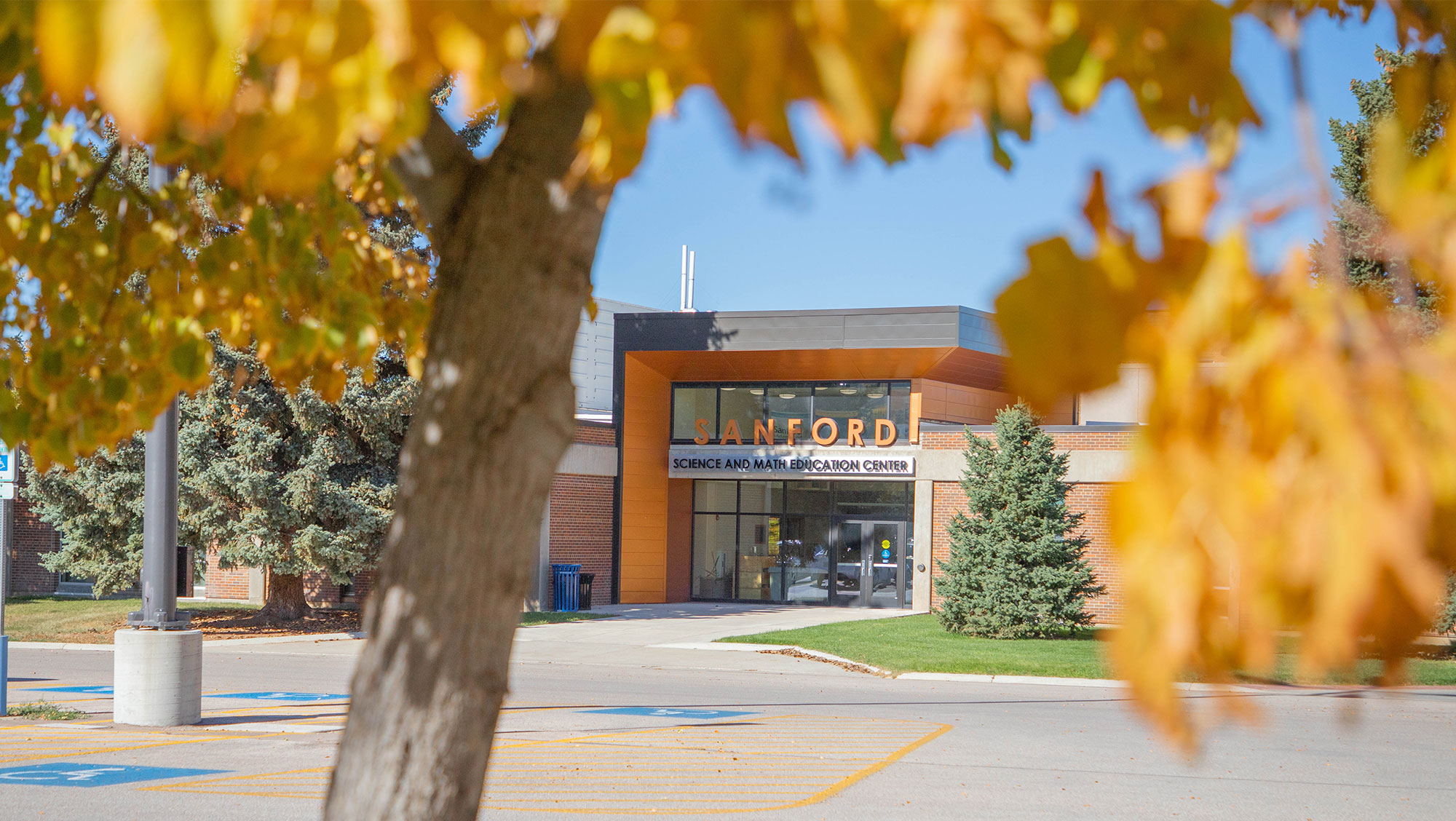 The front of the Sanford Education Center at BHSU during fall