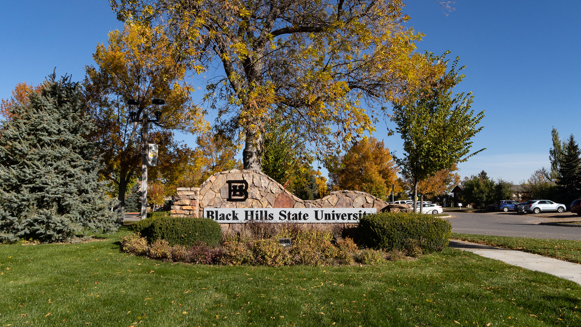 Image of sign on BHSU campus that reads Black Hills State University.