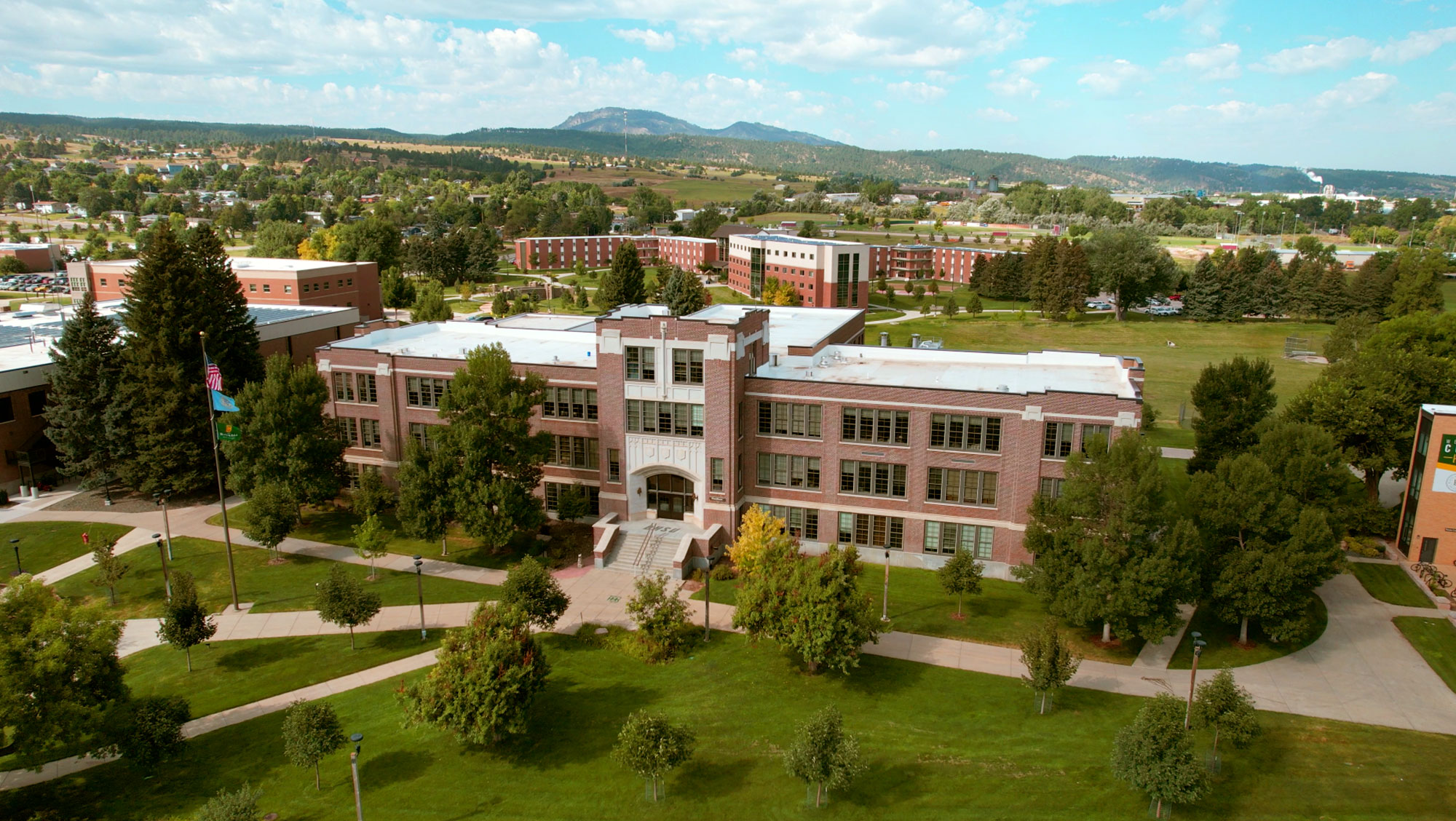Aerial shot of Woodburn and BHSU campus with Crow Peak in the background.
