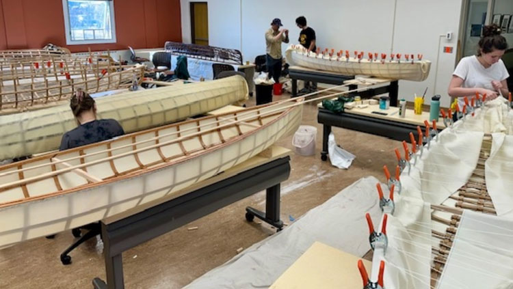 BHSU students work on their canoes