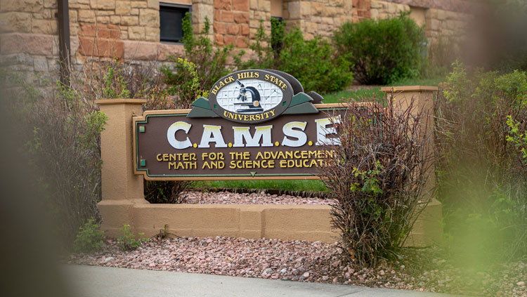 Image of brown sign on BHSU campus that says Center for the Advancement of Math and Science Education
