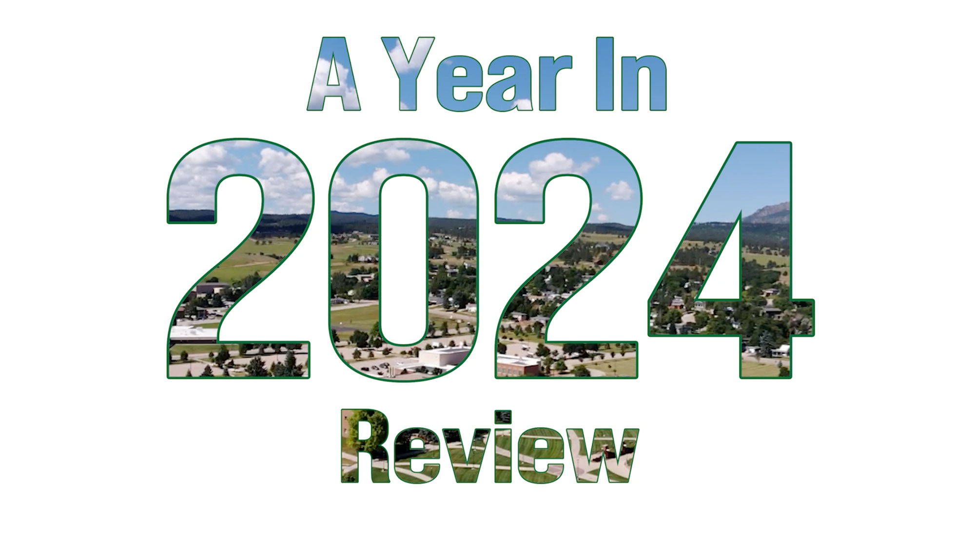 A white background with words saying "A Year in Review: 2024." The words have an image of the BHSU campus as the background.