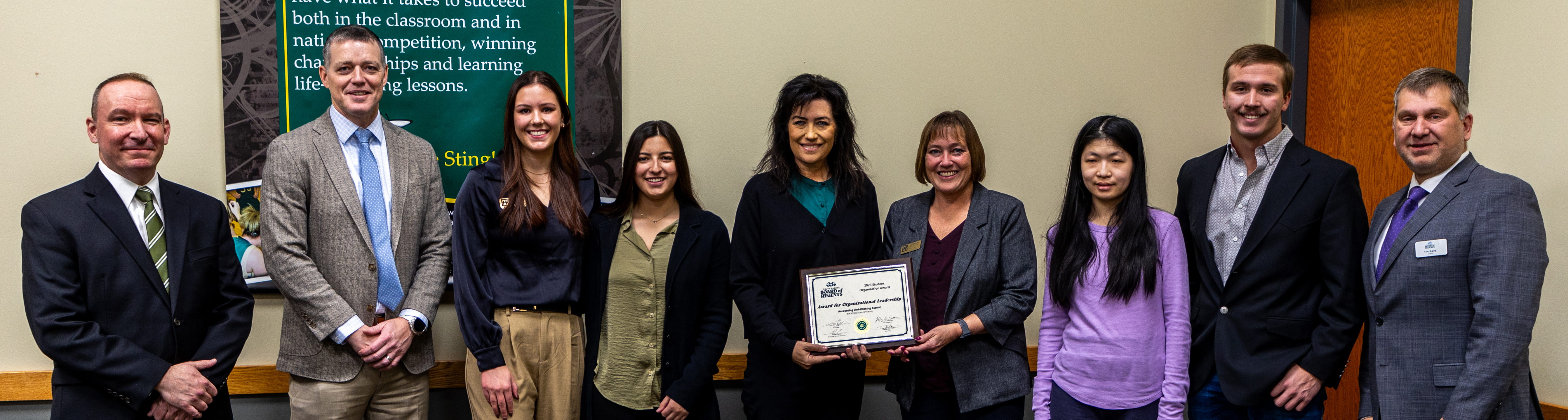 BHSU student organization Kicking Assets earned the Board of Regents Organizational Leadership Award for advancing business and accounting education. (From left) BHSU President Steve Elliott, SDBOR Executive Director and CEO Nathan Lukkes, Liza Stahl, Kenli Herrera, Susan Dana, Laura Prosser, Doreen Hong, Caleb Simons, SDBOR President Tim Rave. 