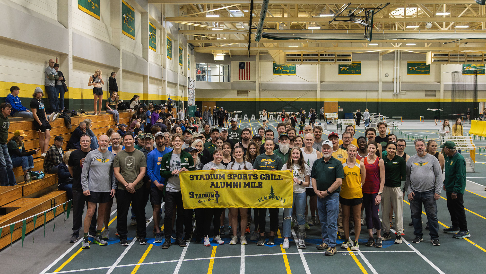 Participants of the 31st Alumni Mile held in Jan. 2024 pose for a picture during the event. The 32nd Stadium Sports Grill Alumni Mile will be held Jan. 17-18. 