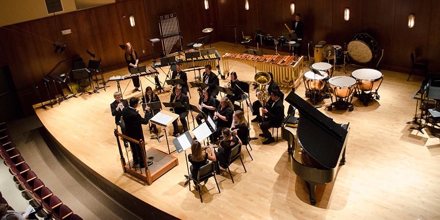 Students perform in Clare and Josef Meier Hall.