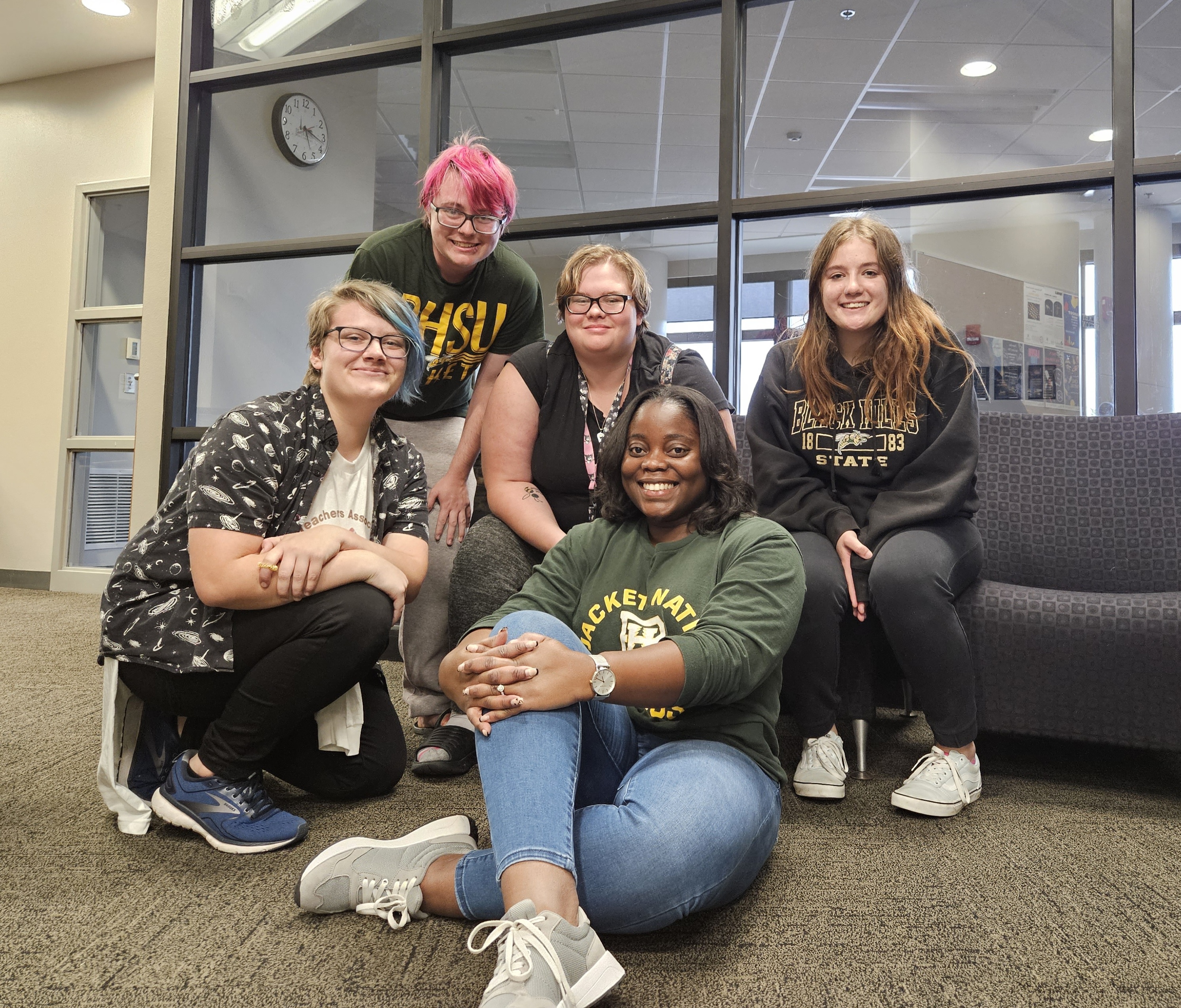 Five Future Teachers Association members pose for a photo.