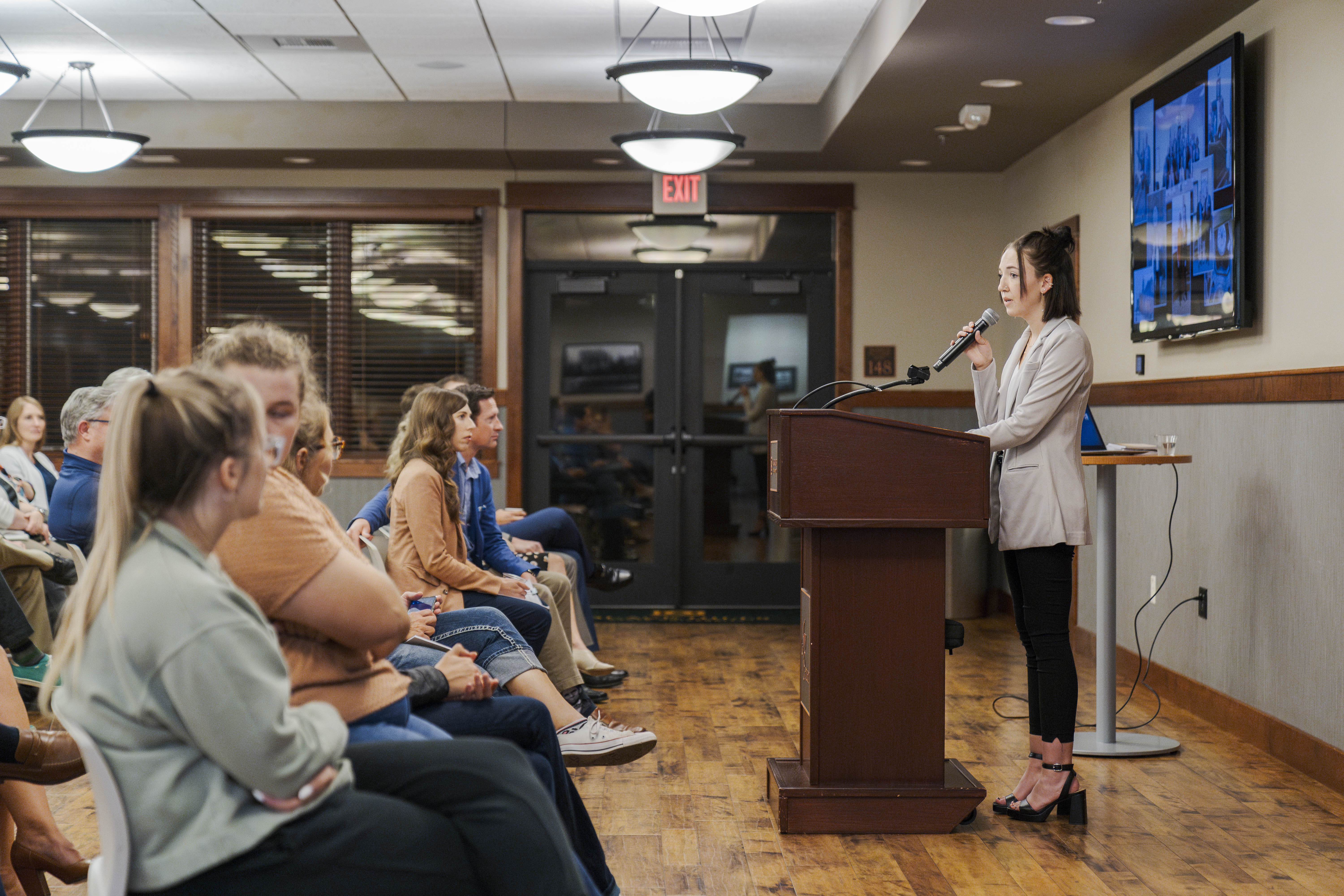 A political science student gives a speech at a Civics Day event on campus. 