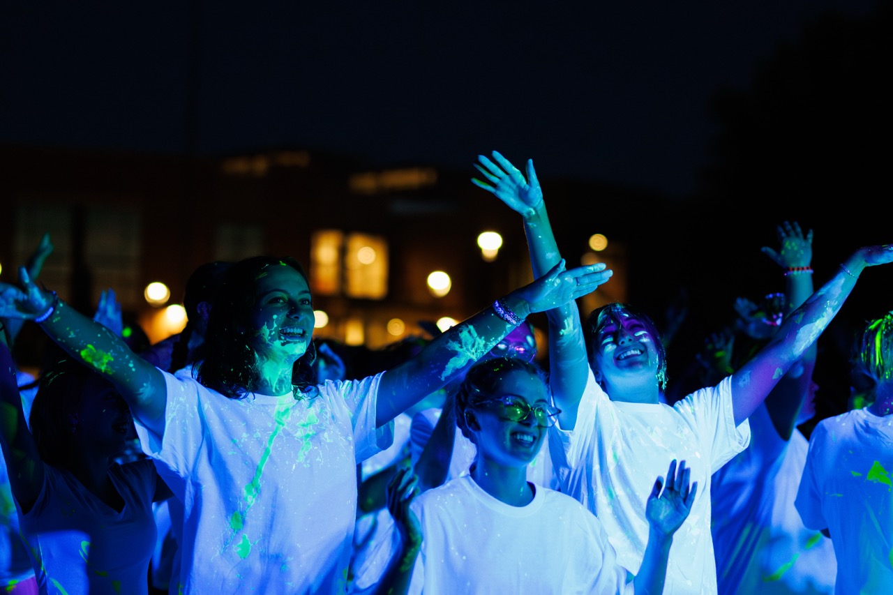 New student enjoying the glow dance