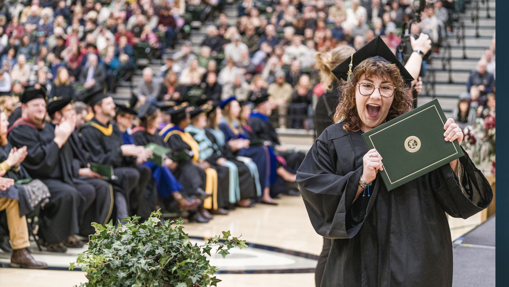 A BHSU graduate receives her diploma