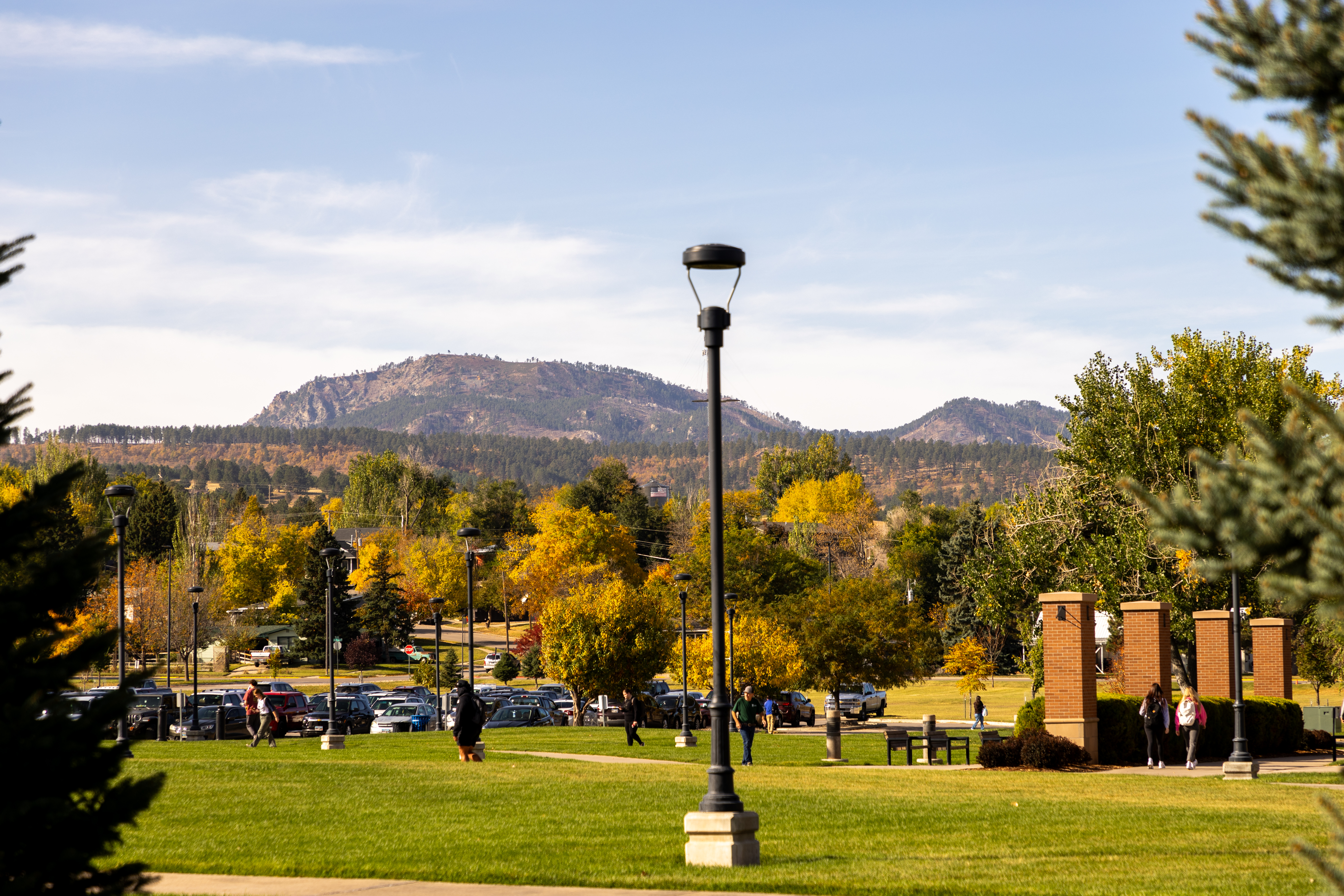 Students walking on the campus green