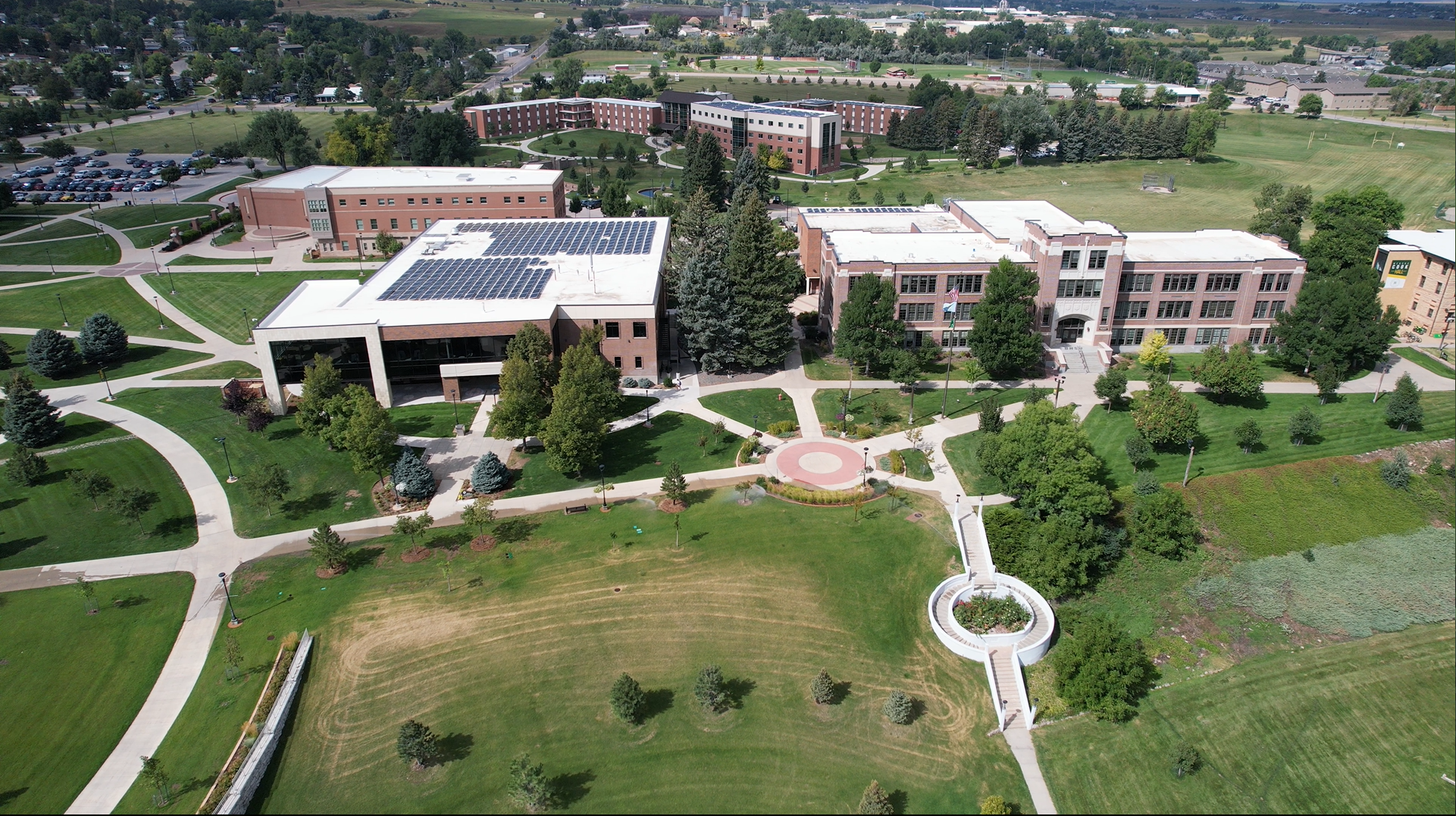 Drone image of campus including the buildings Woodburn Hall, E.Y Berry Library, Meier Hall, and the Peaks.