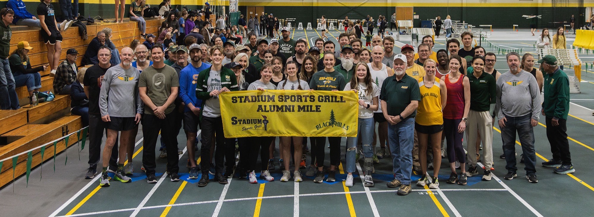 Participants of the 31st Alumni Mile held in Jan. 2024 pose for a picture during the event. The 32nd Stadium Sports Grill Alumni Mile will be held Jan. 17-18. 