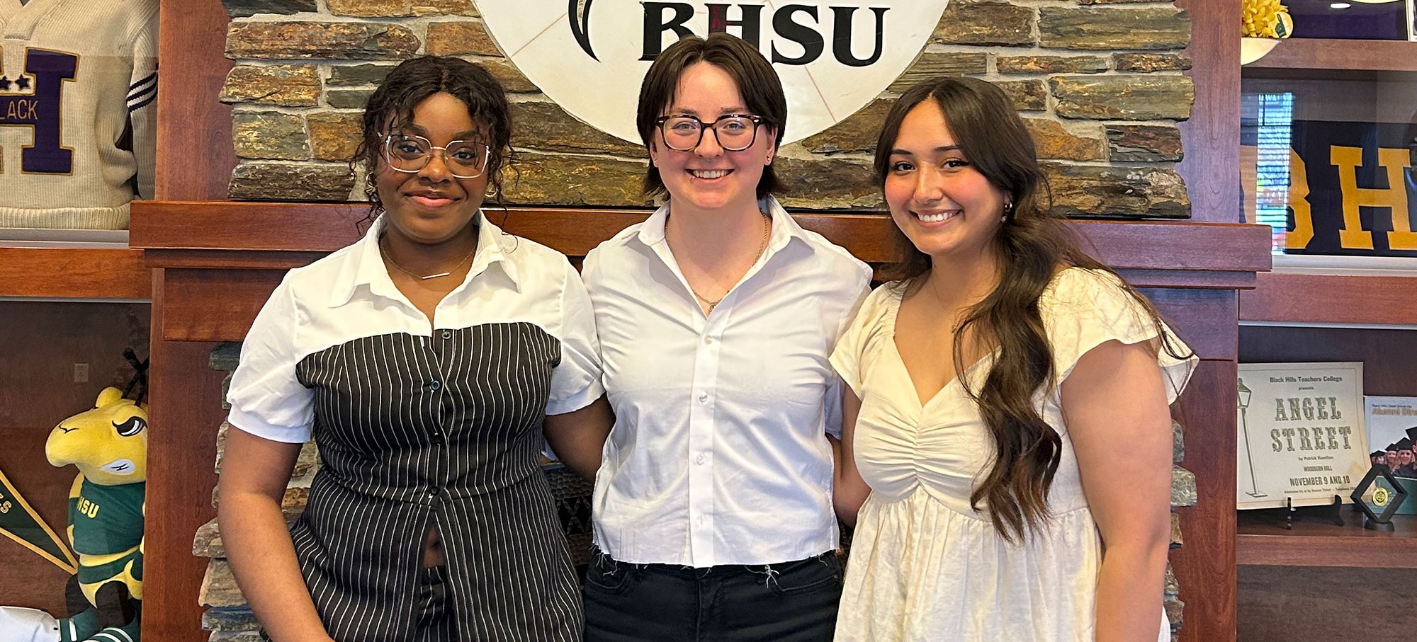 Madara Mesembe, Arianna Scherer, and Alyssa Diaz pose for a photo together.