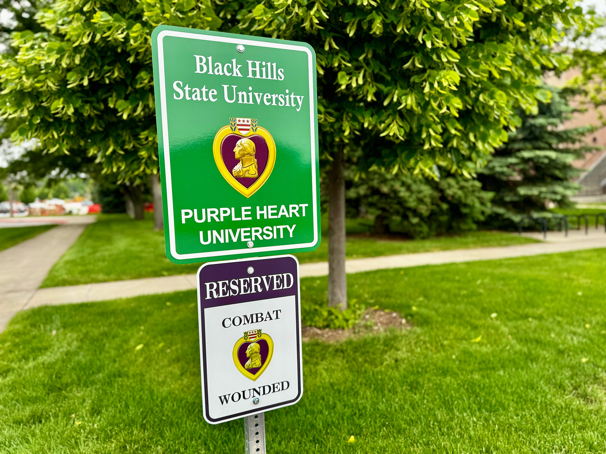 Image of sign on campus that says Black Hills State University Purple Heart University