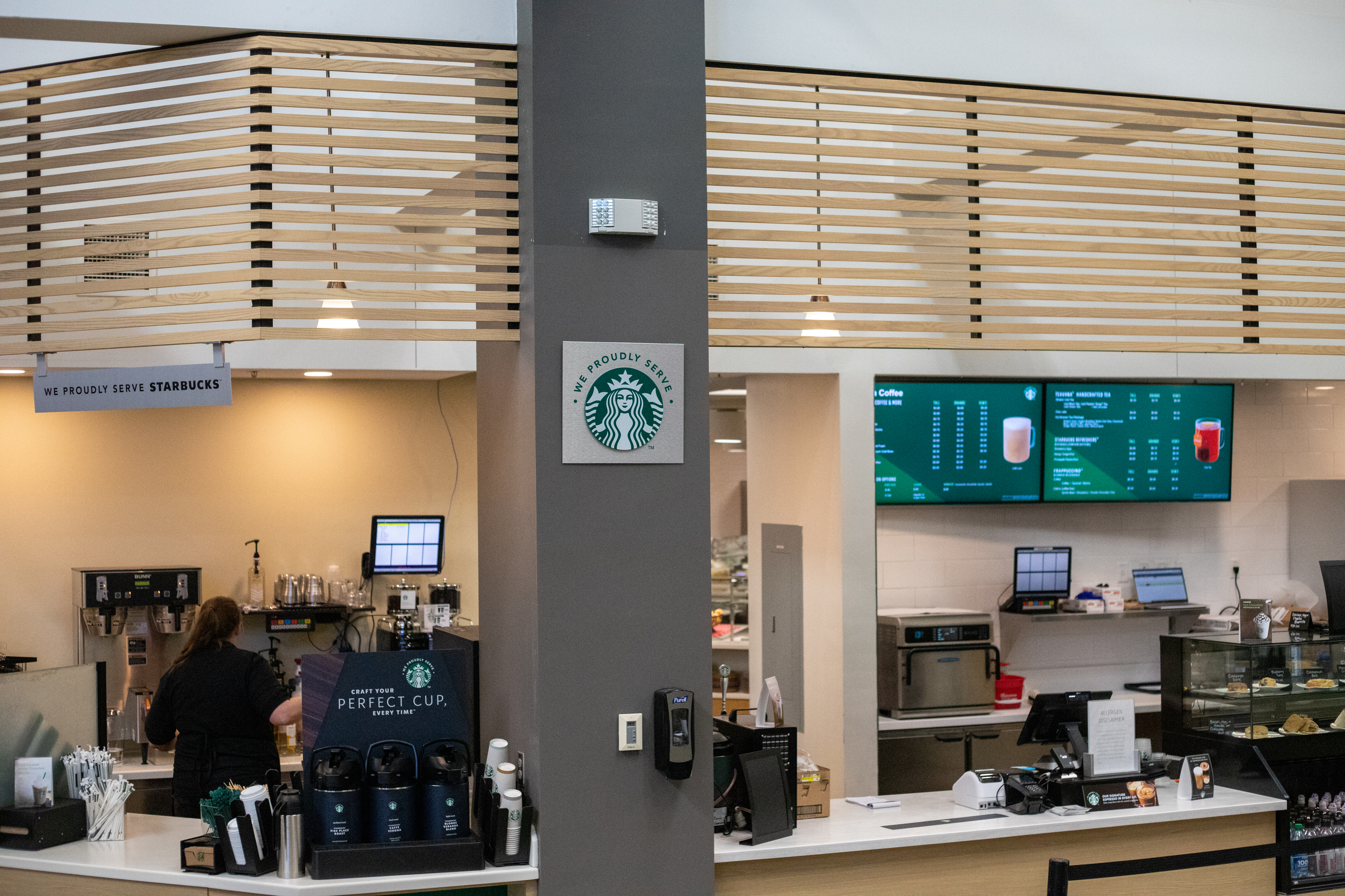 Student working behind the counter at Union Coffee.