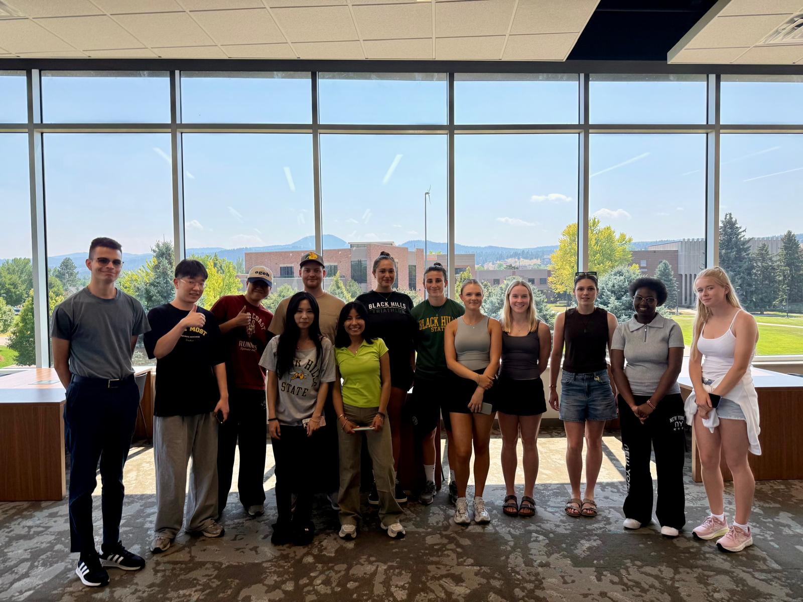International Students smiling on campus